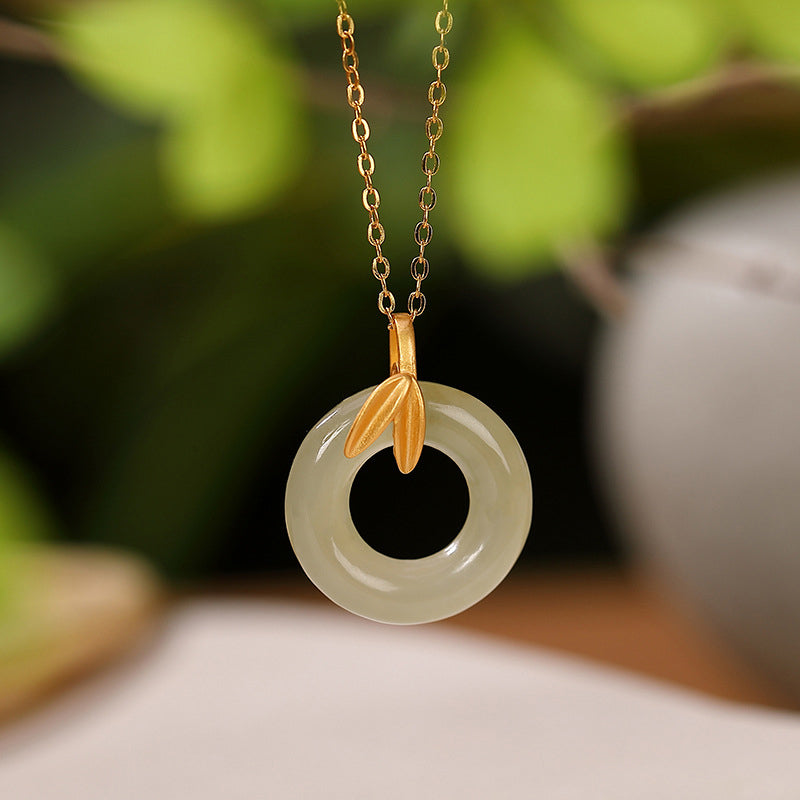 Collier en argent sterling et jade cyan avec boucle de paix pour l'harmonie