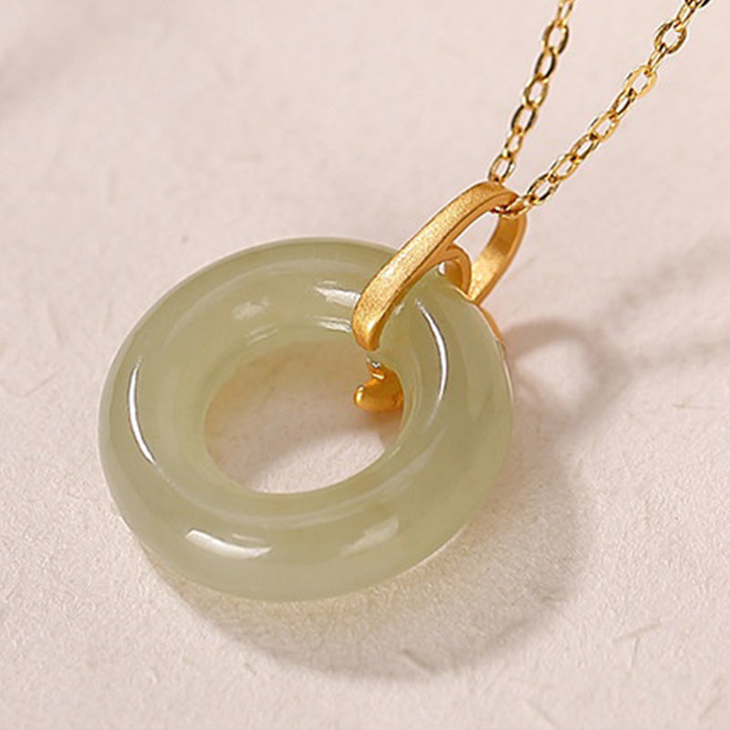 Collier en argent sterling et jade cyan avec boucle de paix pour l'harmonie