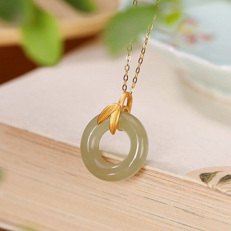 Collier en argent sterling et jade cyan avec boucle de paix pour l'harmonie