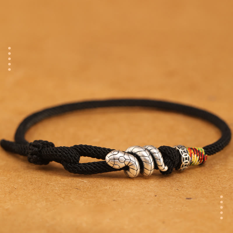 Bracelet en argent sterling rouge foncé 14-17 cm avec pièce de monnaie serpent et cordon rouge