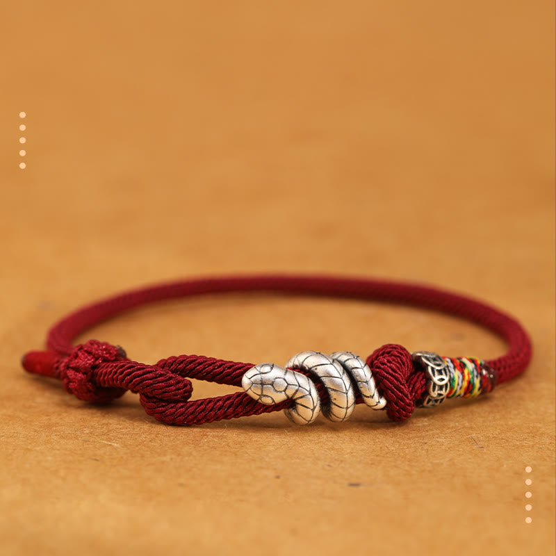 Bracelet en argent sterling rouge foncé 14-17 cm avec pièce de monnaie serpent et cordon rouge