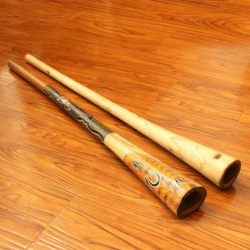 Two decorative Didgeridoos made of Australian Teak Wood displayed side by side