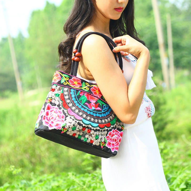 Sac à main en toile de coton brodé recto verso avec symboles de prospérité