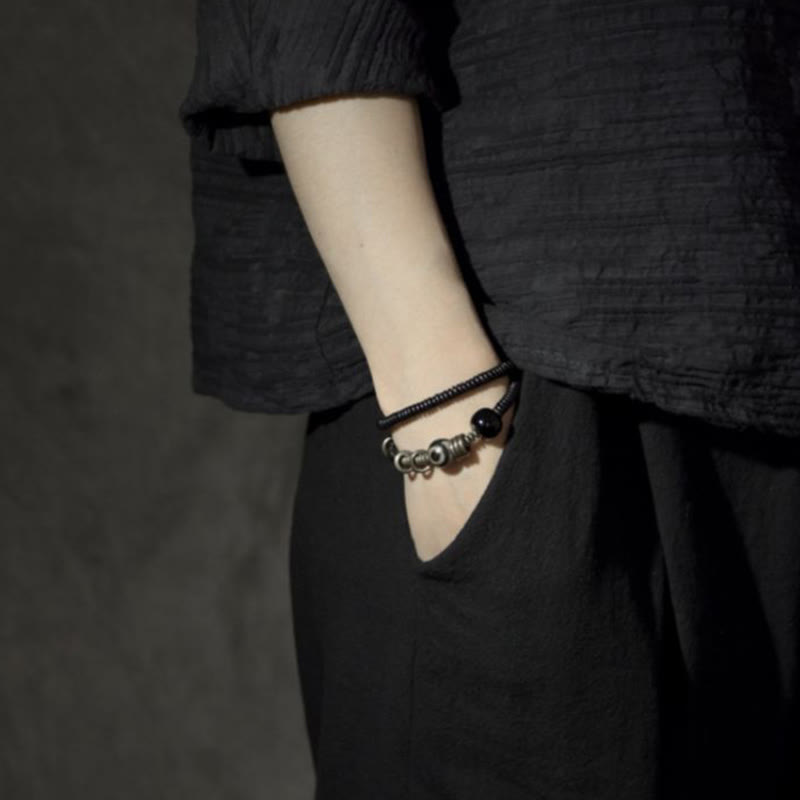 Bracelet double tour en bois d'ébène et obsidienne de santal vert pour le calme