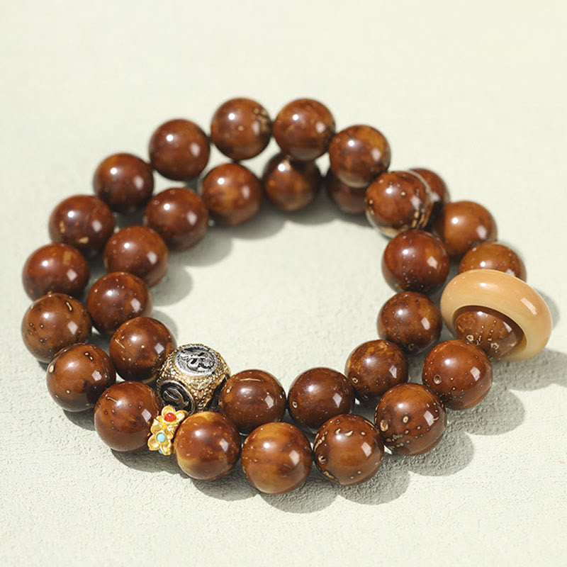 Bracelet spirituel double tour en or violet et graine de Bodhi