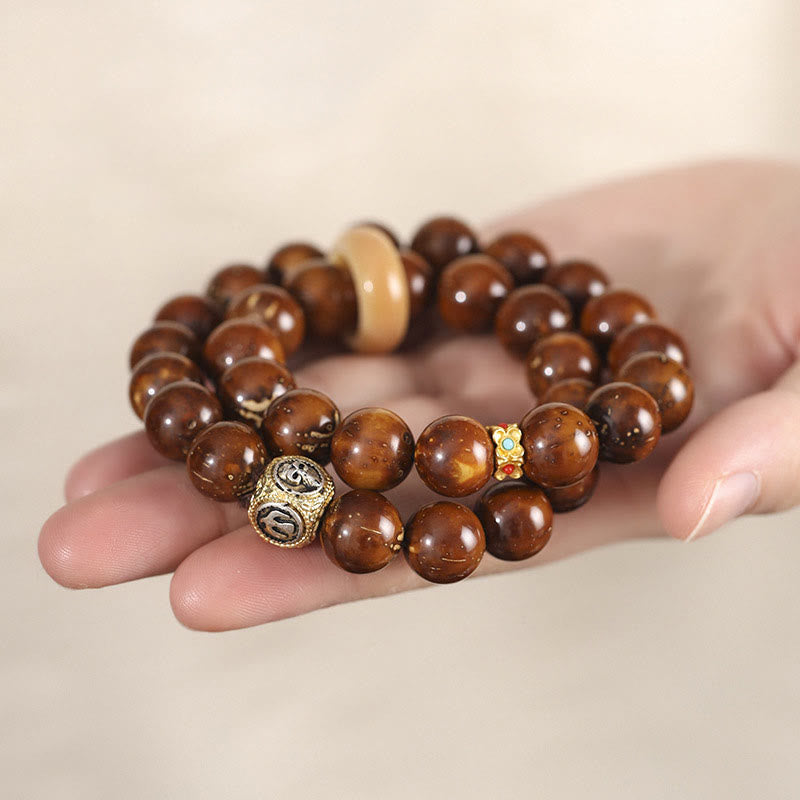 Bracelet spirituel double tour en or violet et graine de Bodhi