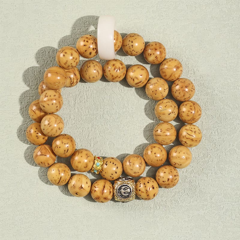 Bracelet spirituel double tour en or violet et graine de Bodhi