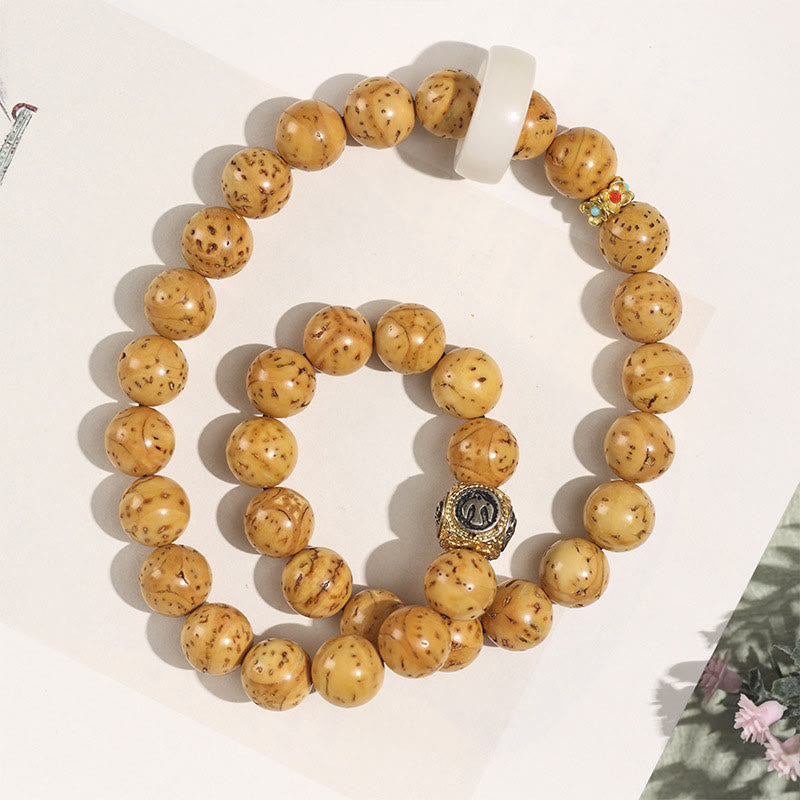 Bracelet spirituel double tour en or violet et graine de Bodhi