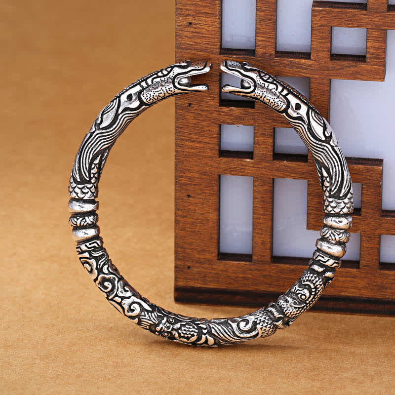 Bracelet porte-bonheur sculpté en tête de dragon en cuivre et argent 8 mm