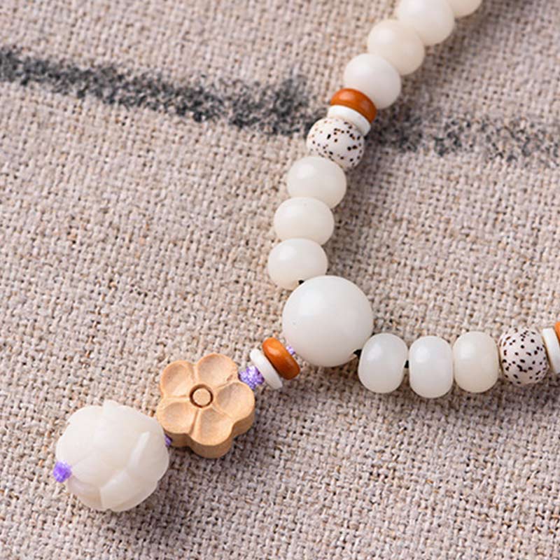Bracelet Lotus unisexe avec jade blanc, graines de Bodhi et bénédictions