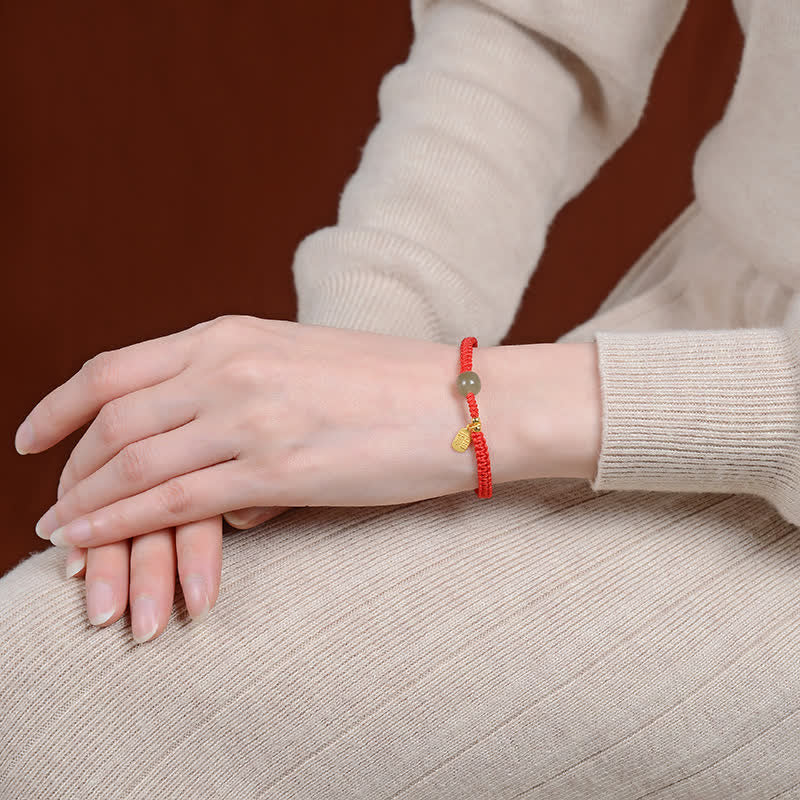 Adjustable 7x8mm Hetian Jade Red String Blessing Bracelet