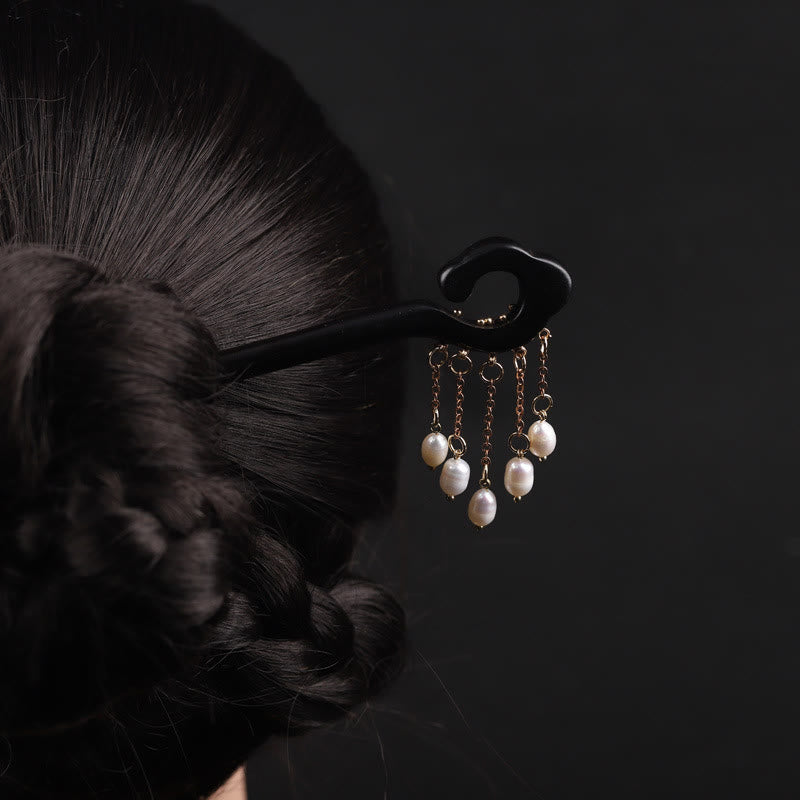 Épingle à cheveux chinoise en ébène avec pompon en perles pour la protection et la sagesse