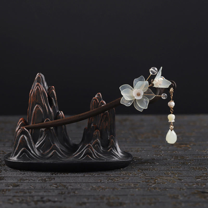 Épingle à cheveux chinoise en jade et ébène avec pompon en magnolia
