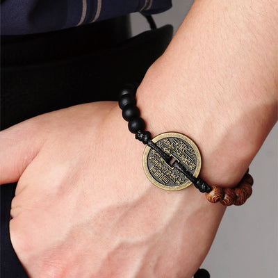 Bracelet de protection en bois d'ébène et pièces de cuivre Bagua