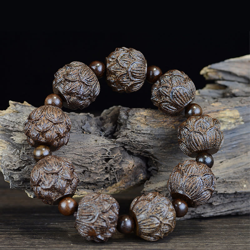 Bracelet d'équilibre en bois d'ébène avec dragon lotus et arhats
