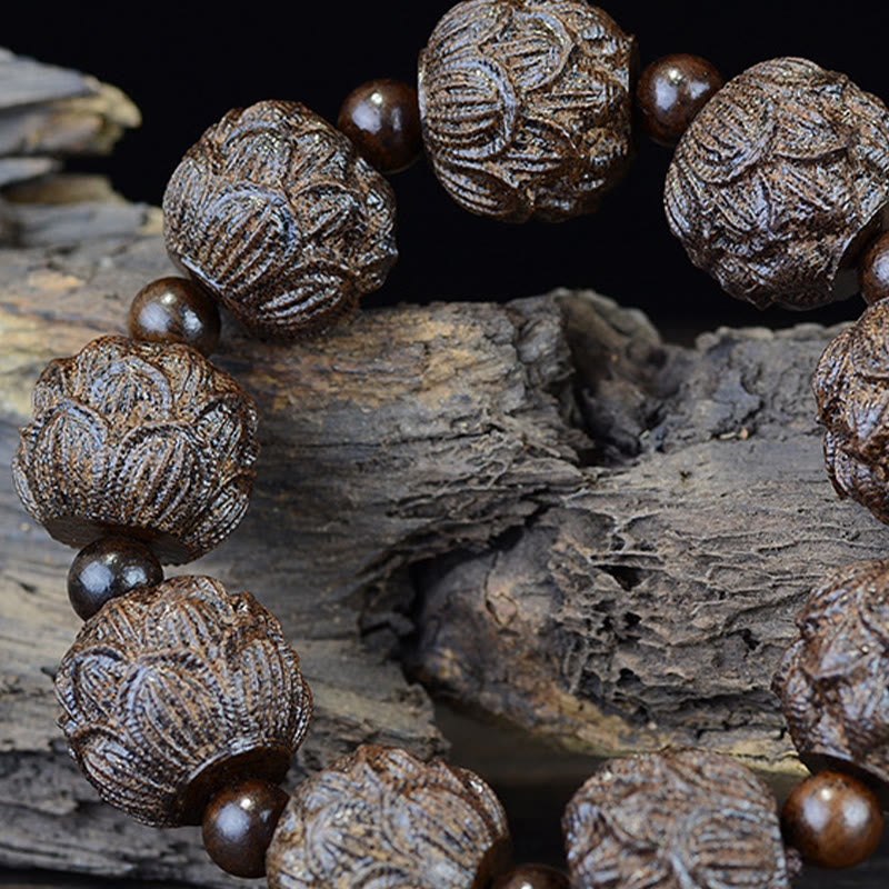 Bracelet d'équilibre en bois d'ébène avec dragon lotus et arhats