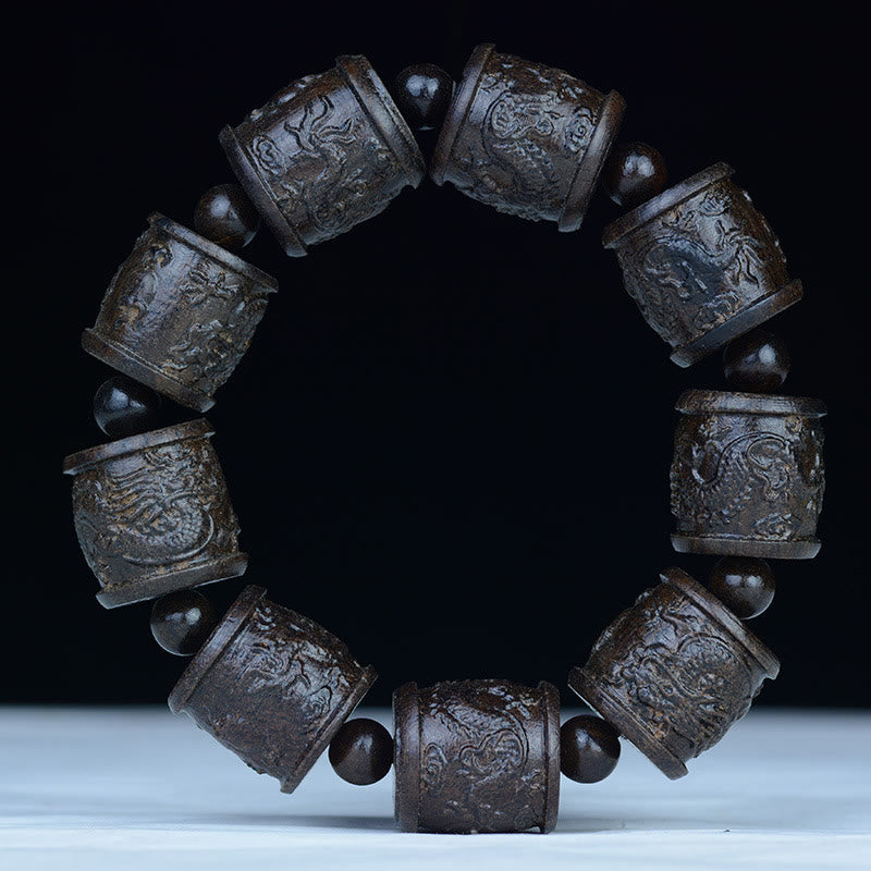 Bracelet d'équilibre en bois d'ébène avec dragon lotus et arhats