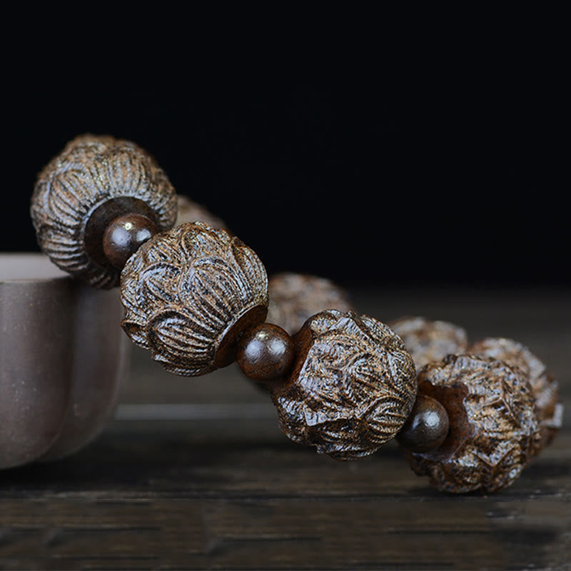 Bracelet d'équilibre en bois d'ébène avec dragon lotus et arhats