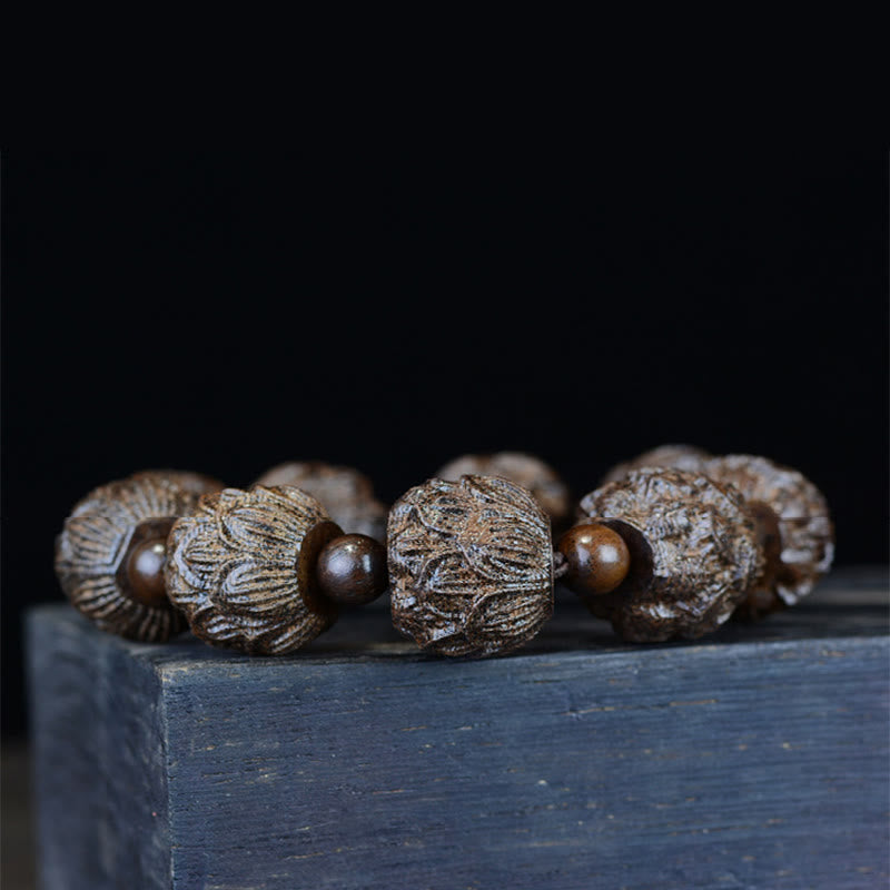 Bracelet d'équilibre en bois d'ébène avec dragon lotus et arhats