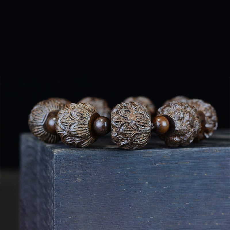 Bracelet d'équilibre en bois d'ébène avec dragon lotus et arhats