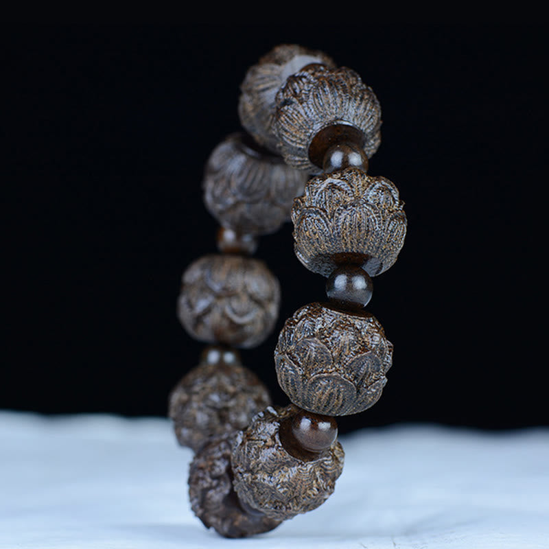 Bracelet d'équilibre en bois d'ébène avec dragon lotus et arhats