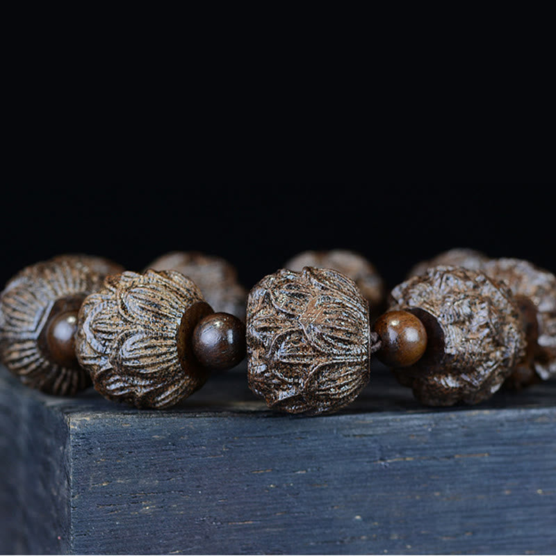 Bracelet d'équilibre en bois d'ébène avec dragon lotus et arhats
