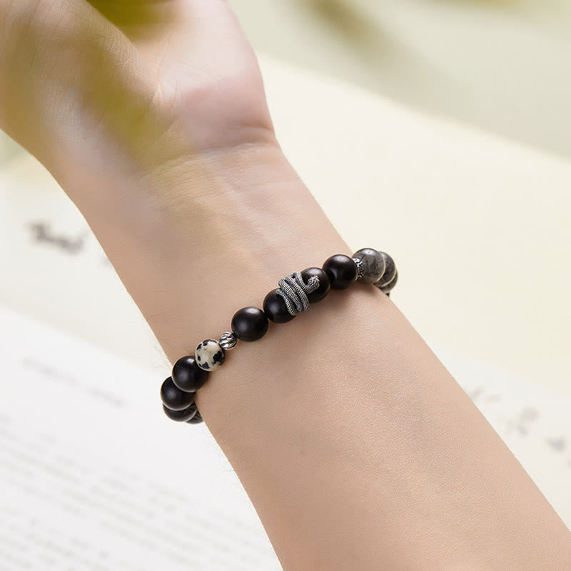 Bracelet d'équilibre en bois d'ébène et quartz rutile noir 10 mm