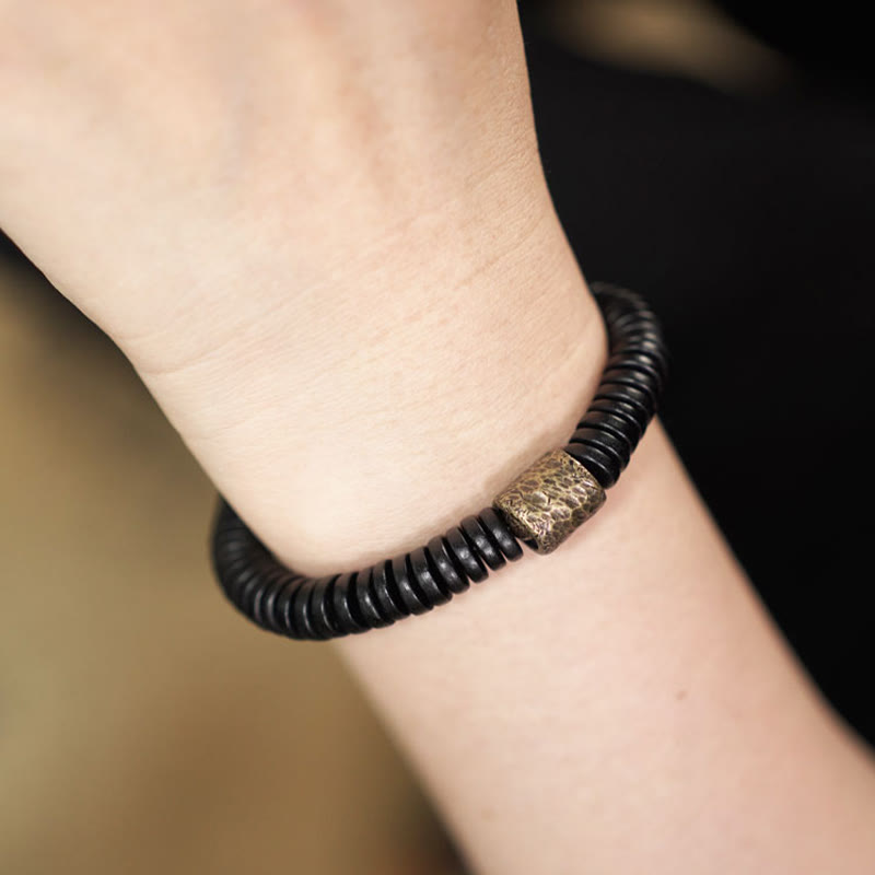 Bracelet apaisant en bois d'ébène et laiton | Bijoux de paix et d'ancrage
