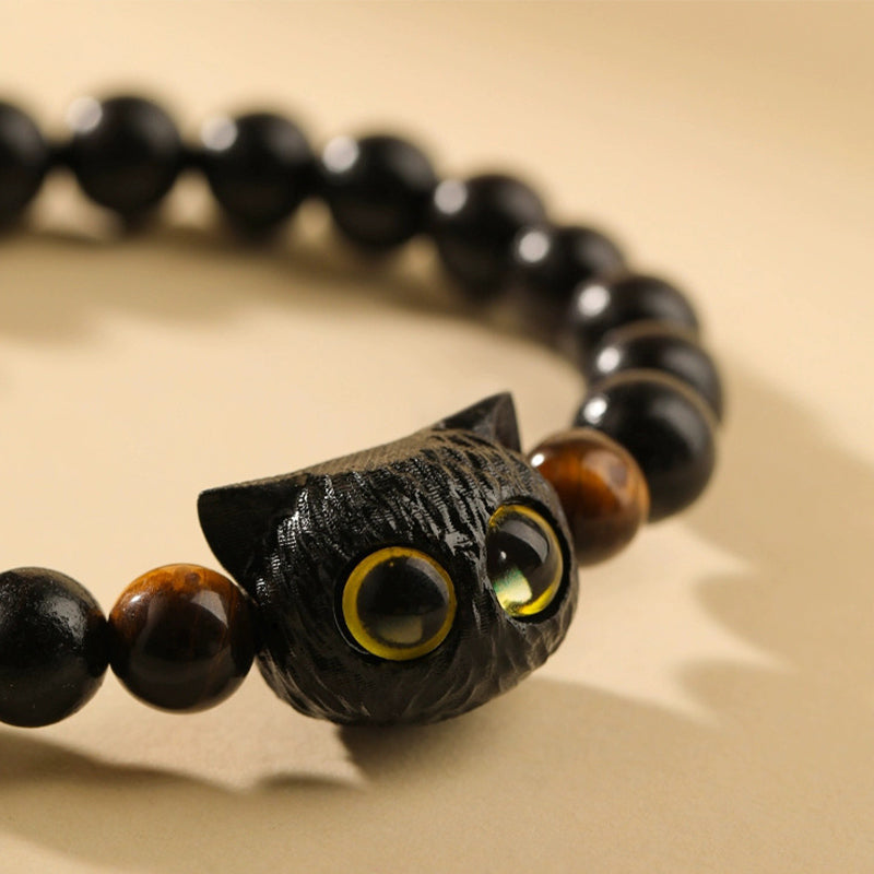Bracelet tête de chat en bois d'ébène 8 mm pour la paix et l'équilibre
