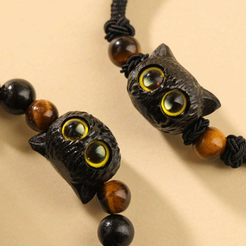 Bracelet tête de chat en bois d'ébène 8 mm pour la paix et l'équilibre