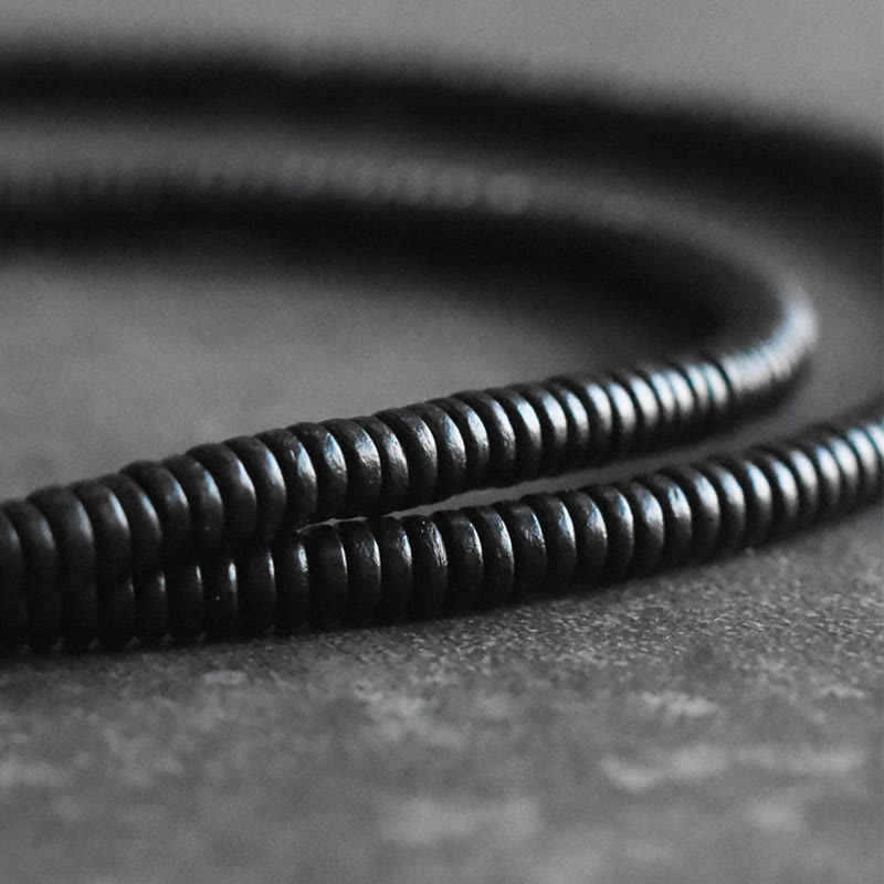 Bracelet multicouche en bois d'ébène et cuivre pour l'équilibre et le calme