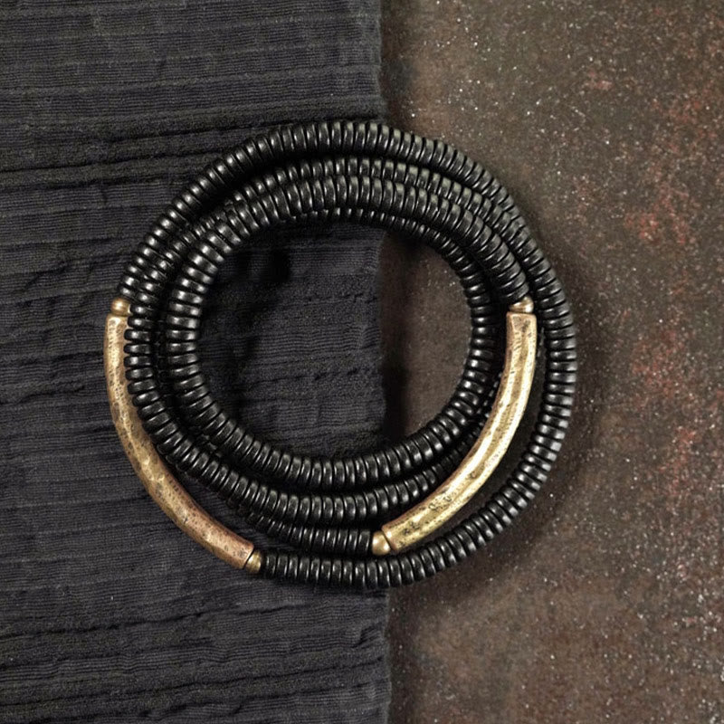 Bracelet multicouche en bois d'ébène et cuivre pour l'équilibre et le calme