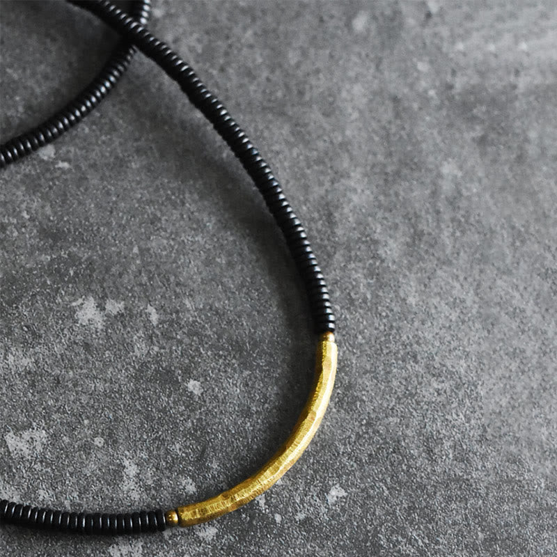 Bracelet multicouche en bois d'ébène et cuivre pour l'équilibre et le calme