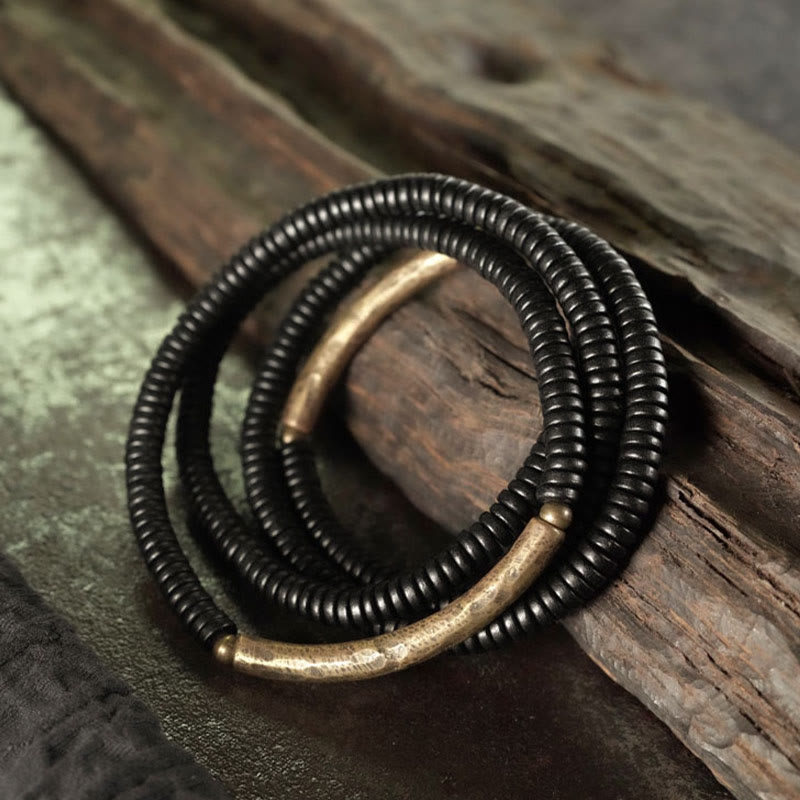 Bracelet multicouche en bois d'ébène et cuivre pour l'équilibre et le calme