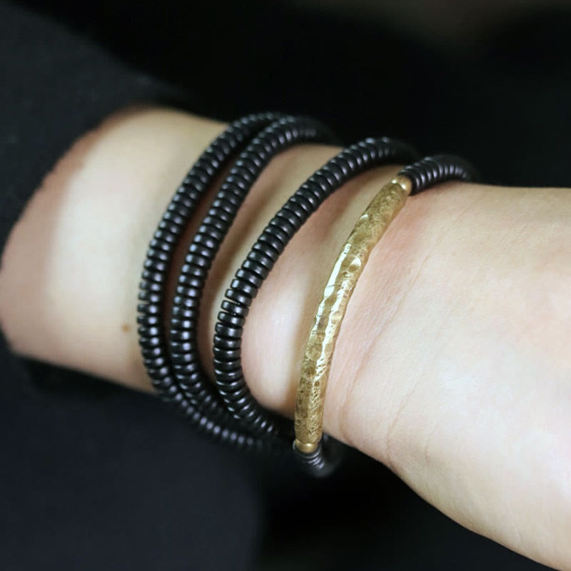 Bracelet multicouche en bois d'ébène et cuivre pour l'équilibre et le calme