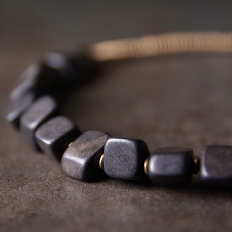 Bracelet spirituel double tour en bois d'ébène et cuivre Peace