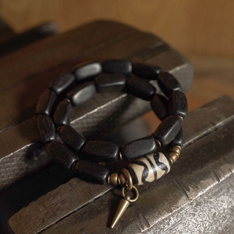 Bracelet double tour en bois d'ébène avec perles Dzi pour l'équilibre