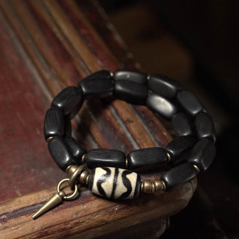 Bracelet double tour en bois d'ébène avec perles Dzi pour l'équilibre