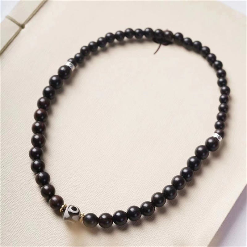 Bracelet double tour en perles dzi en bois d'ébène pour l'équilibre