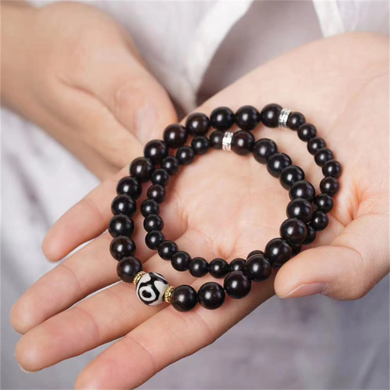 Bracelet double tour en perles dzi en bois d'ébène pour l'équilibre
