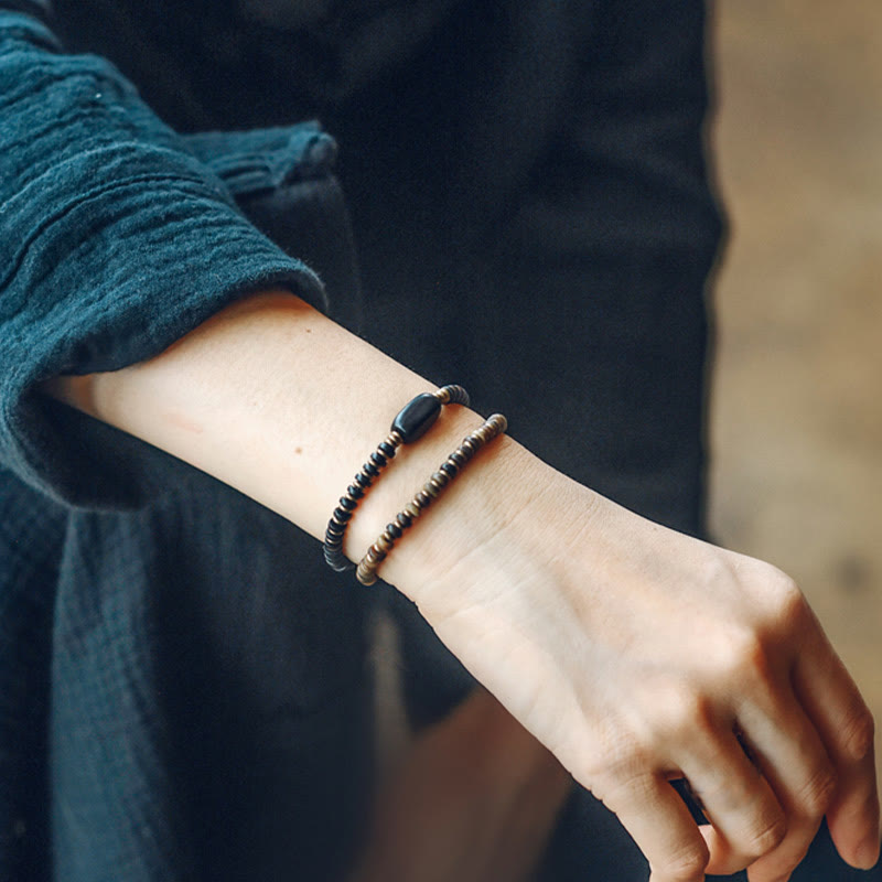 Bracelet double tour en bois d'ébène et bois de santal vert pour le calme