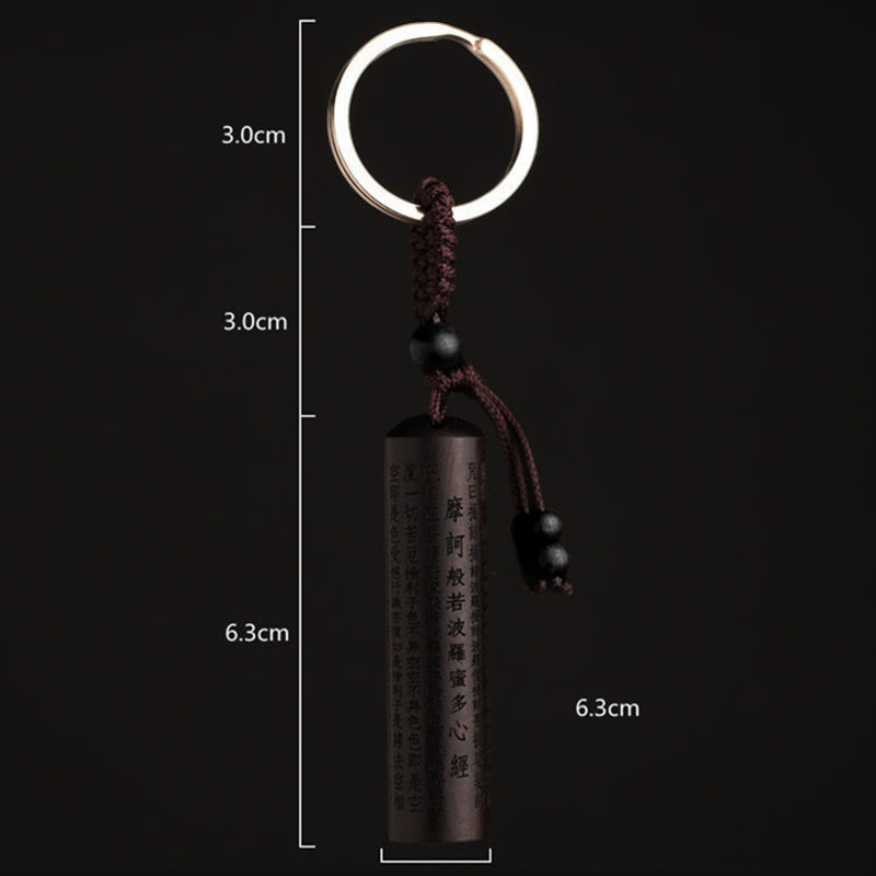 Porte-clés en bois d'ébène avec symbole du Sutra de la Paix pour l'équilibre spirituel