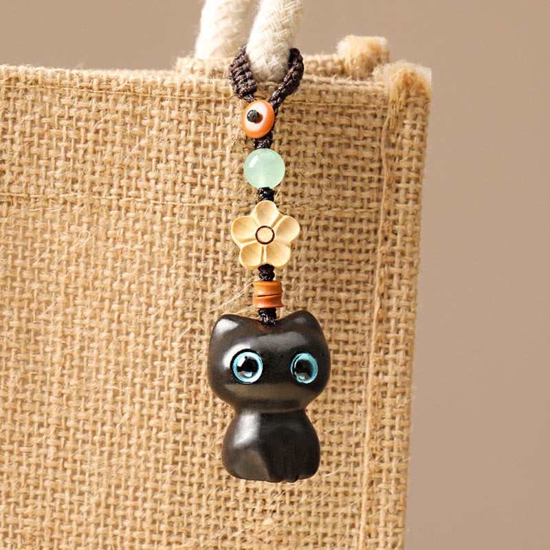 Porte-clés chat porte-bonheur en bois d'ébène pour la paix et l'équilibre spirituels