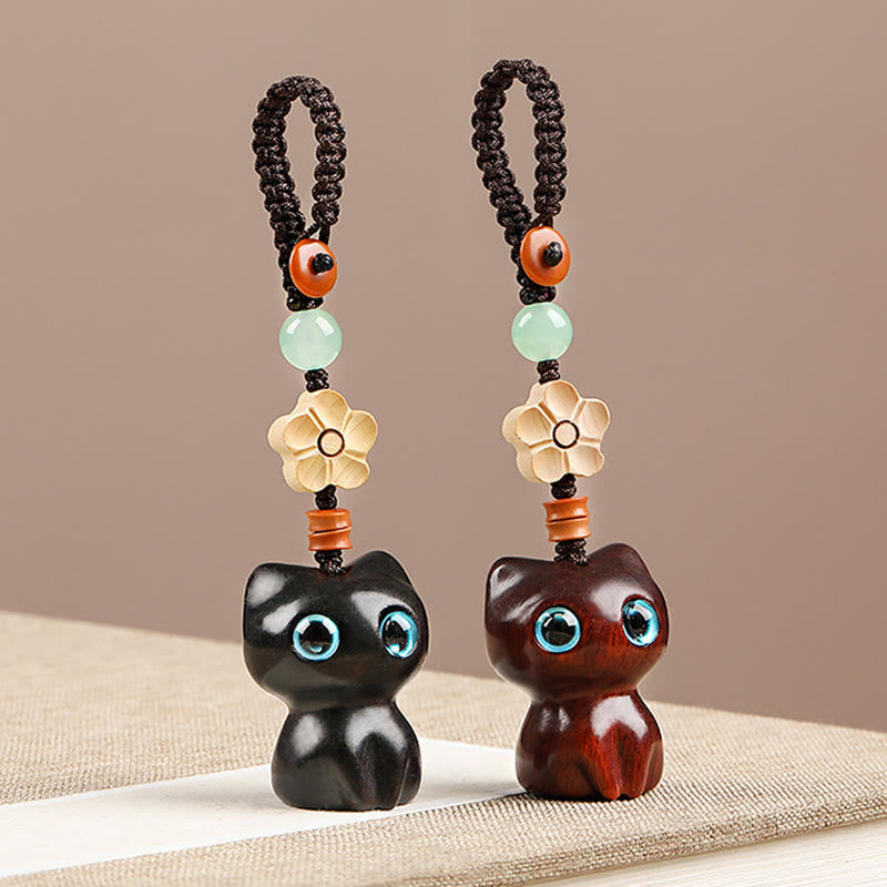Porte-clés chat porte-bonheur en bois d'ébène pour la paix et l'équilibre spirituels