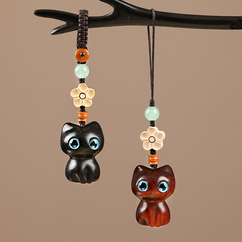 Porte-clés chat porte-bonheur en bois d'ébène pour la paix et l'équilibre spirituels