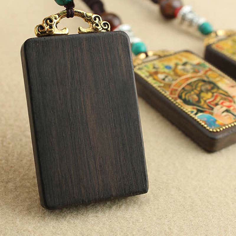 Collier pendentif en bois d'ébène avec cinq dieux de la richesse | Paix