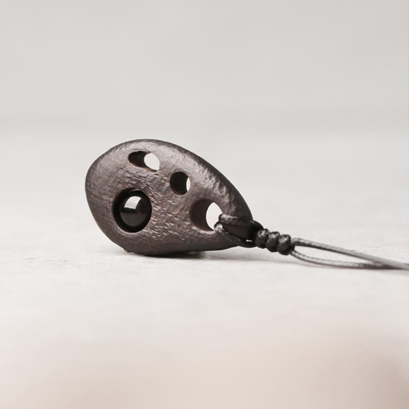 Collier en bois d'ébène et obsidienne pour la paix intérieure et la protection