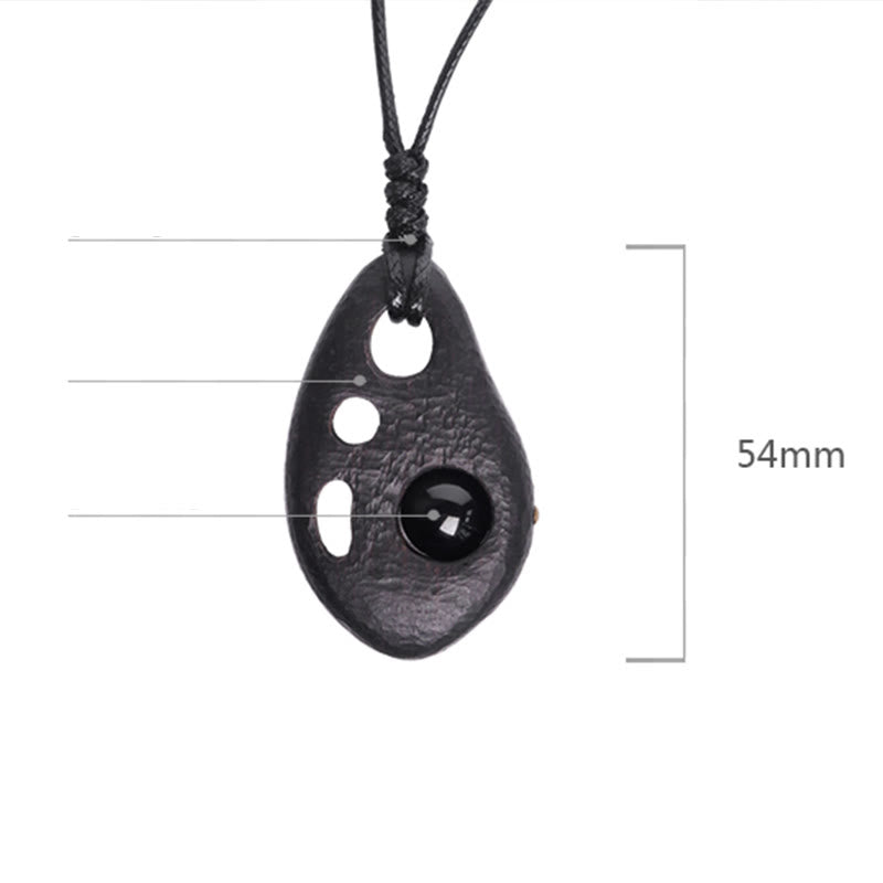 Collier en bois d'ébène et obsidienne pour la paix intérieure et la protection