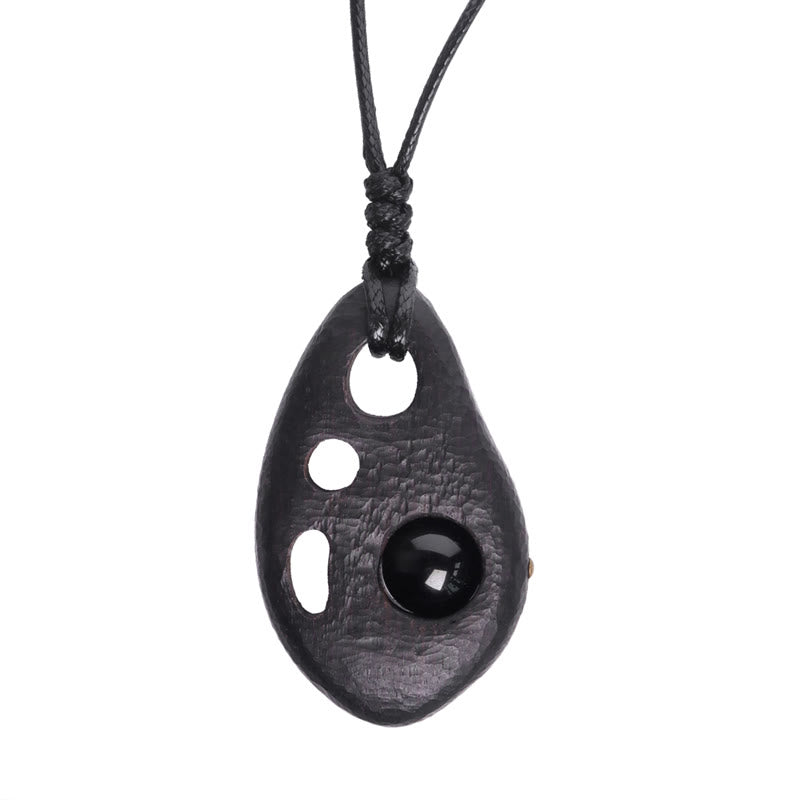 Collier en bois d'ébène et obsidienne pour la paix intérieure et la protection