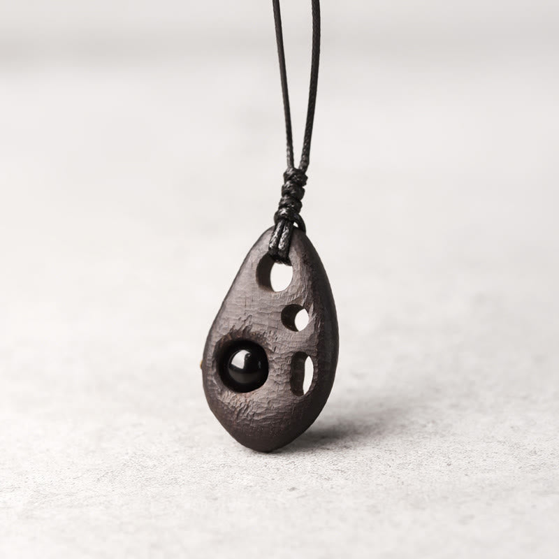 Collier en bois d'ébène et obsidienne pour la paix intérieure et la protection